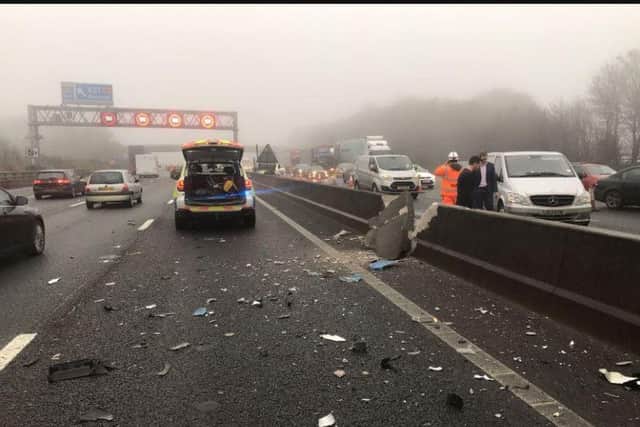 Debris left on the M1 after a lorry crashed into the central reservation