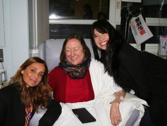 Louise Redknapp and Daisy Lowe with a patient