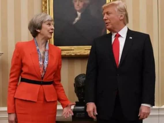 Theresa May and Donald Trump.