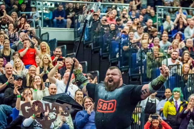 British title winner Eddie Hall celebrates in front of fans at Doncaster Dome. Photos: Marisa Cashill.