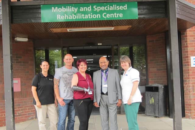 Liz with Dr Ramesh Munjal, consultant in Specialised Mobility & Rehabilitation and his team