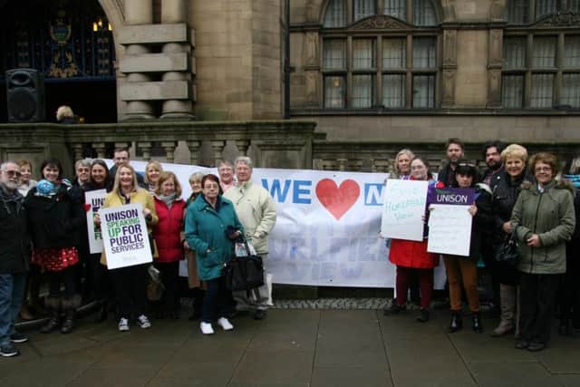 Campaigners and carers outside the Town Hall