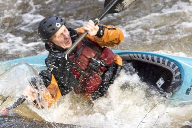 A canoeist in action on the River Don