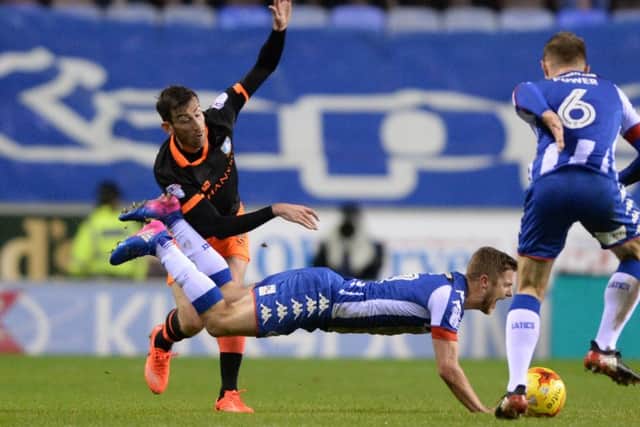 David Jones fells Wigan's Michael Jacobs. Picture: Bruce Rollinson