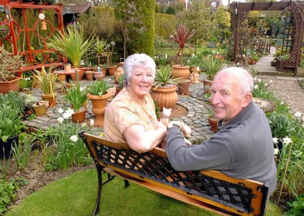 Pictured are Christine & Keith Littlewood in their garden at Meadowhead Ave,Sheffield