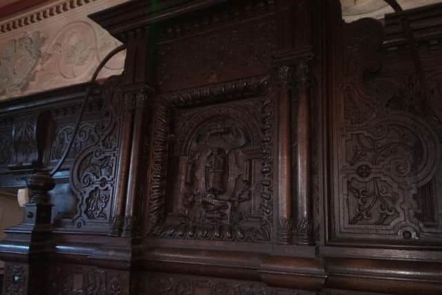 Ornate wooden panelling inside the Carbrook Hall pub