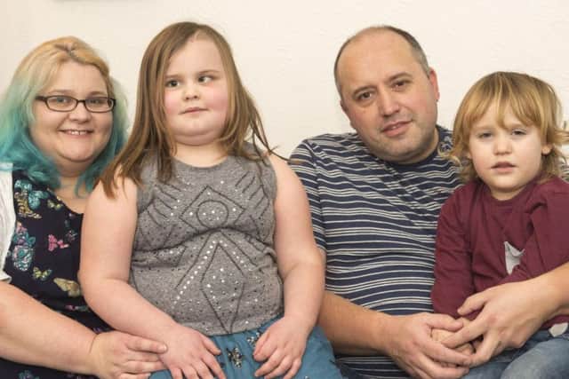 Mum Lara and dad Mark have set up a fundraising page so the family can stay together while Amber has her treatment in Oklahoma. Picture: Dean Atkins/The Star