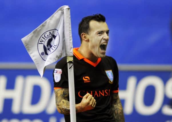 Ross Wallace celebrates netting the only goal of the game for the Owls