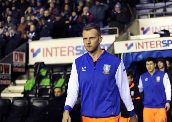 Jordan Rhodes on his Owls debut enters the field at the DW Stadium on Friday.....Pic Steve Ellis
