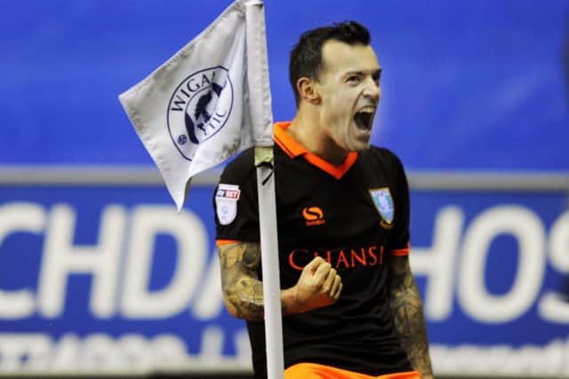 Ross Wallace celebrates his goal against Wigan Athletic