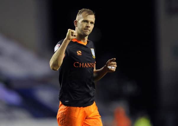 Victory salute on his debut from Owls Jordan Rhodes