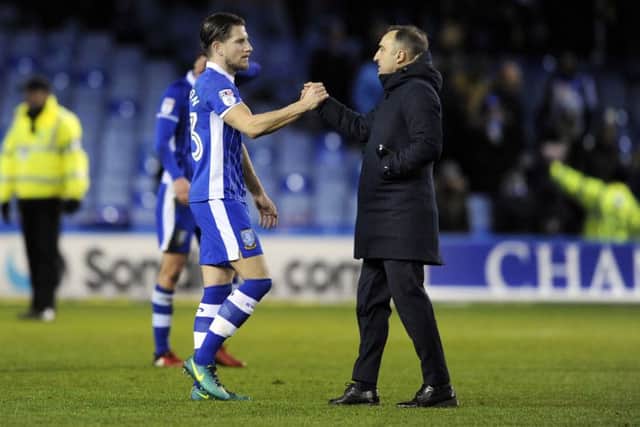 Carlos Carvalhal, left, and Sam Hutchinson