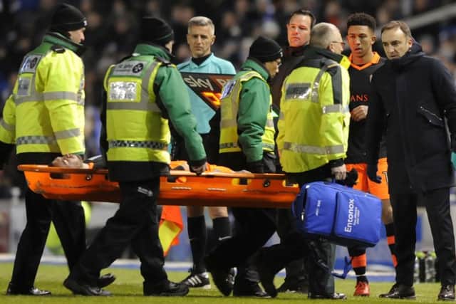 Jack Hunt is stretchered off at Brighton