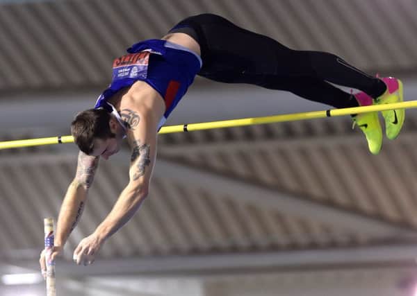 Sheffield's Luke Cutts on his way to winning the pole vault. Photos: Andrew Roe .