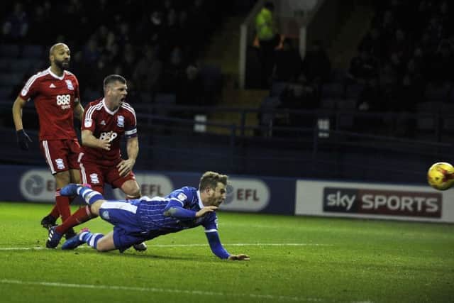 Sam Winnall dives in to head home Sheffield Wednesday's second goal