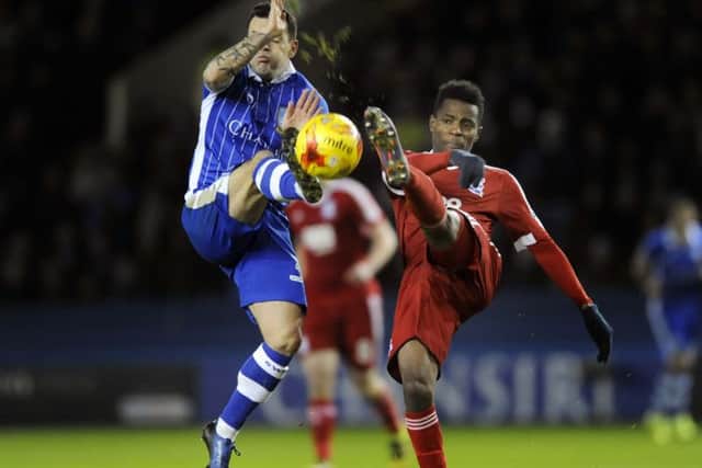 Owls Ross Wallace with Citys Cheick Keita