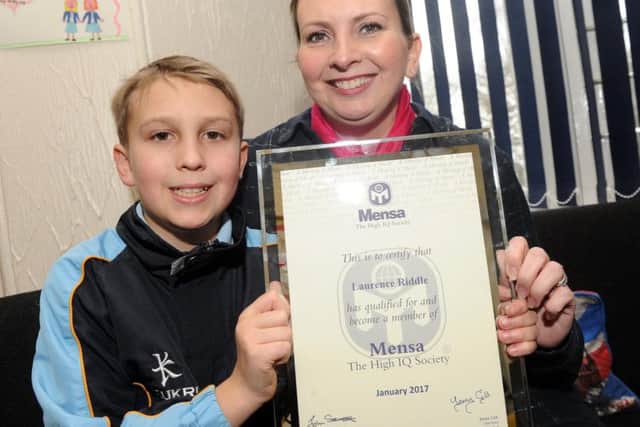 Laurence's mum Helen said she knew he was smart but never realised quite how smart