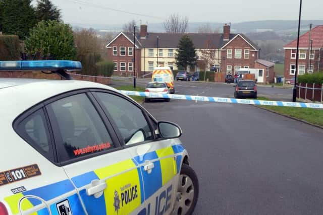 Forensic experts examine crime scene after shooting in Sheffield