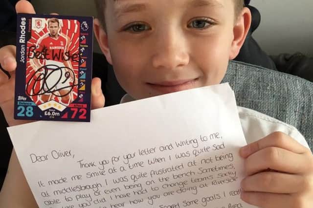 Oliver with his letter from Jordan Rhodes.