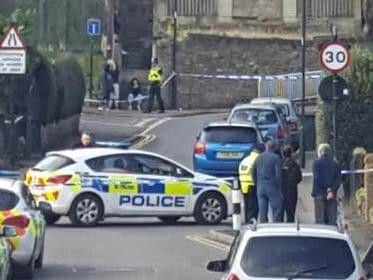 Police at the scene of the shooting (PA)