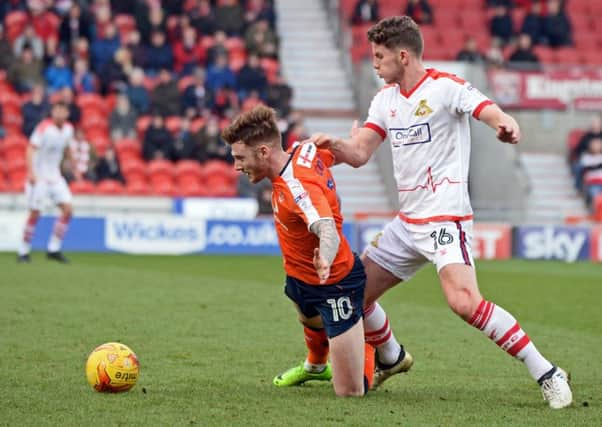 Jordan Houghton in action against Luton. Pictures: Marie Caley