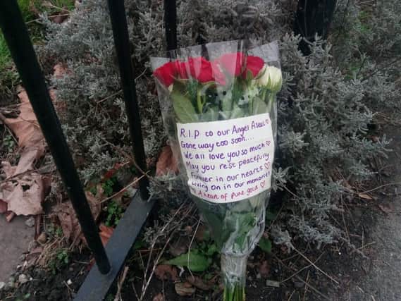Flowers left close to the scene of the fatal shooting