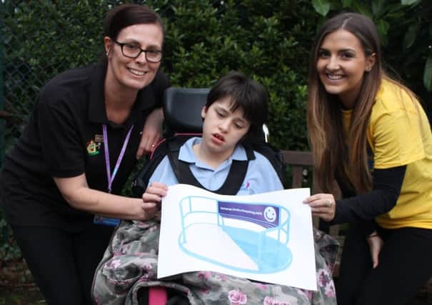 Staff and supporters of Sheffield Childrens Hospital have raised Â£8,000 to buy a wheelchair friendly roundabout for children. Paula Widdowson, Freya Coulter and Caitlin Hallatt are pictured.