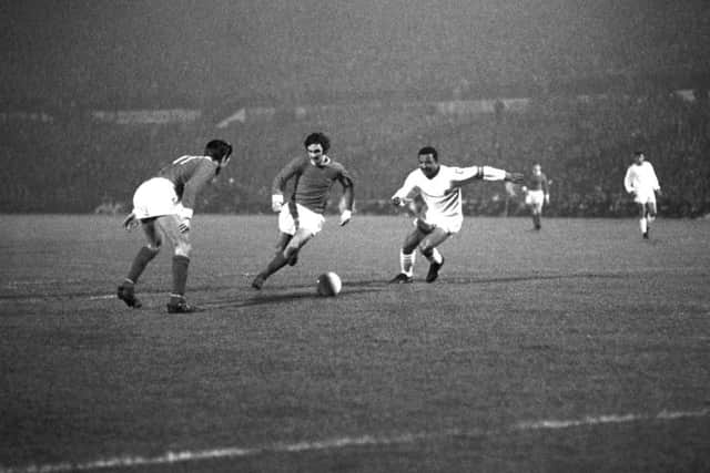 European Cup Benfica v Manchester United :  George Best takes the ball past Mario Coluna.