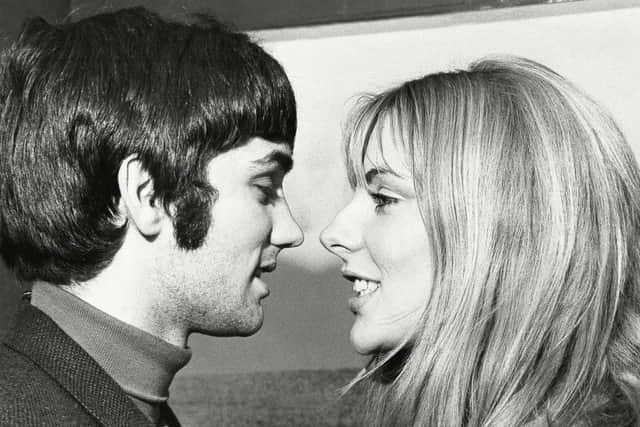 Photo by Manchester/REX/Shutterstock February 1968. George Best (died November 2005) Shows Off His New Girlfriend Jackie Glass A Freelance Film Scriptwriter The Latest In A Long Line Of Leggy Blondes That He Was Involved With.