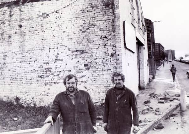 Picture shows the roof of Five Ways Garage, South Street, Sheffield, which blew off in the gale - 15 December 1982
Pictured are two of the men who were in the garage - left to right John Kettle and Steve Palmer -