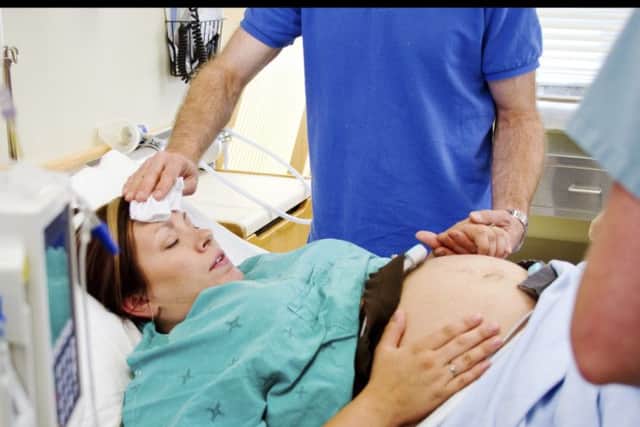 A woman getting ready to give birth.