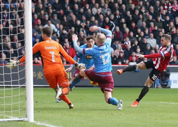 Billy Sharp scores his 21st goal of the season against Scunthorpe last weekend. Pic David Klein/Sportimage