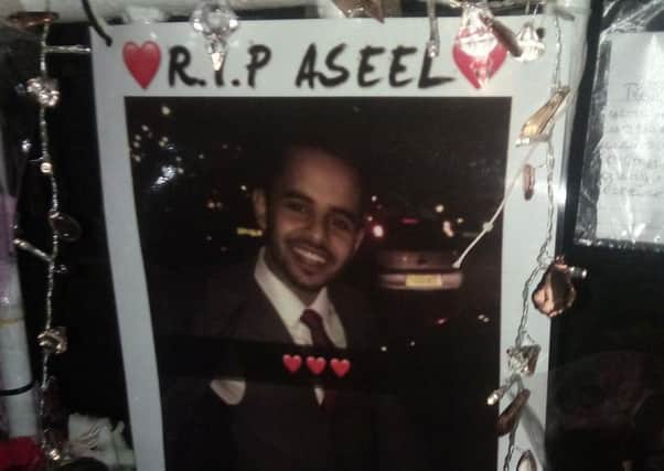Aseel Al-Essaie's family and friends paid respect to him at a candelight vigil tonight