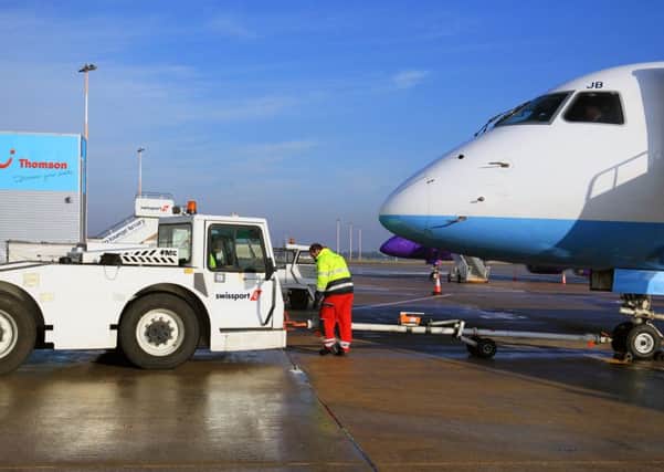 Ground crew at work at Doncaster Sheffield Airport. Picture: Chris Etchells