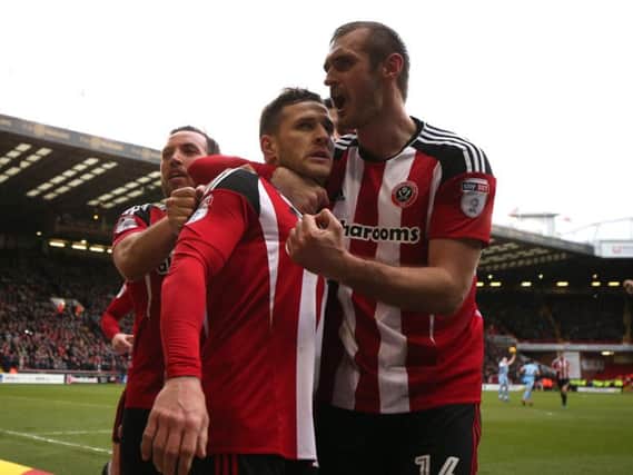 Two-goal Billy Sharp celebrates with Samir Carruthers and James Hanson