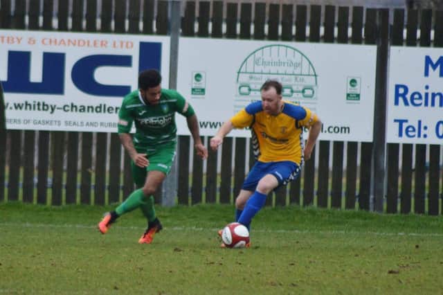 Ashley Burbeary in action against Kidsgrove - he was later sent off for fighting his teammate