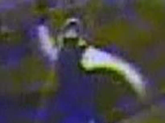 A CCTV image has been released as part of a probe into a bus attack