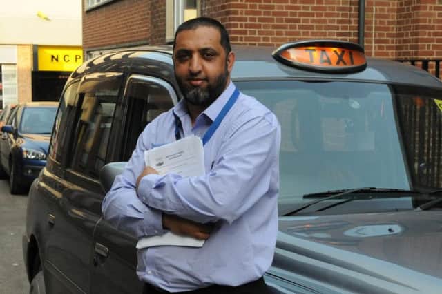 Taxi driver and GMP rep Ibrar Hussain