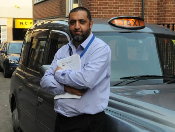 Taxi driver and GMP rep Ibrar Hussain