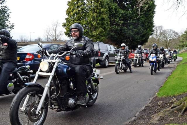 Bikers ride with the hearse up to City Road Crematorium