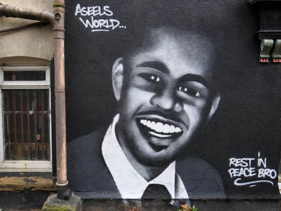 Ben Gourvenec has made a mural to honour the victim of the Upperthorpe shooting on Daniel Hill. Picture: Chris Etchells