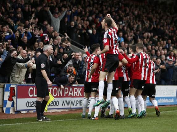 Mark Duffy and his Sheffield United team mates celebrate the opening goal. Simon Bellis/Sportimage
