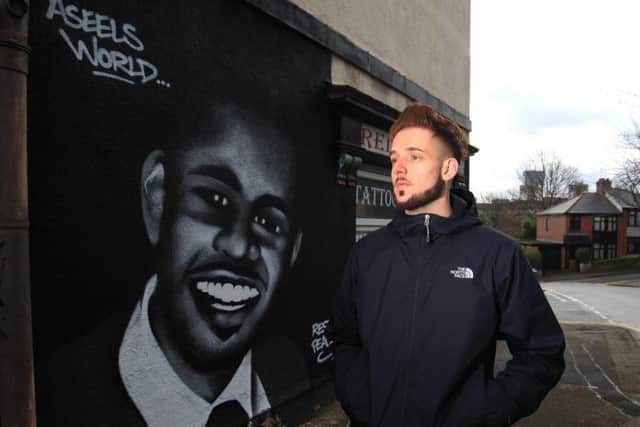 Ben Gourvenec has made a mural to honour the victim of the Upperthorpe shooting on Daniel Hill. Picture: Chris Etchells