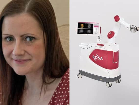 Leanne Hall and the ROSA surgical robot right
