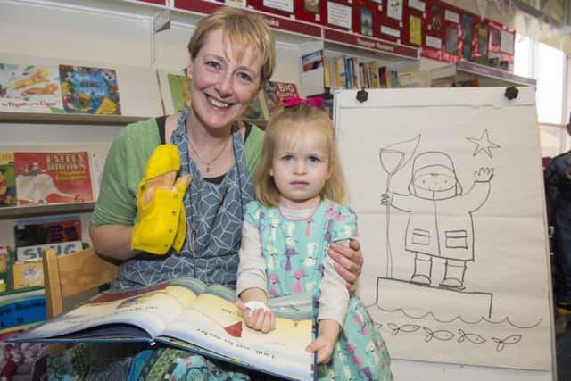 Lily Stone reading 'I'll Catch You If You Fall' with illustrater Layn Marlow at Waterthorpe Library for World Book Day