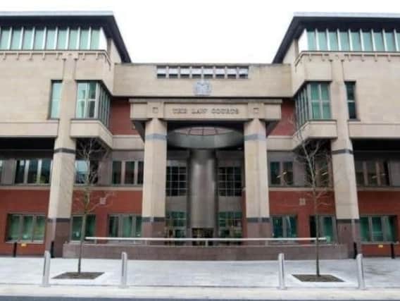 A Sheffield dad who brandished a knife at bouncers when they asked him to leave a popular city-centre pub for drunken behaviour has been spared jail.