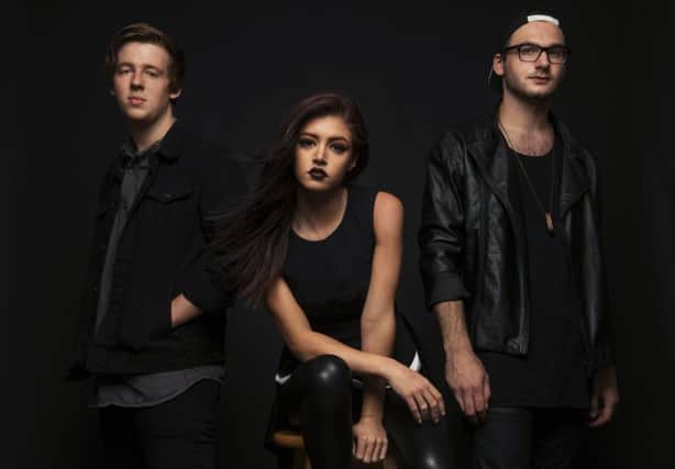 Against the Current are, from left, Dan Gow, Chrissy Costanza and Will Ferri.