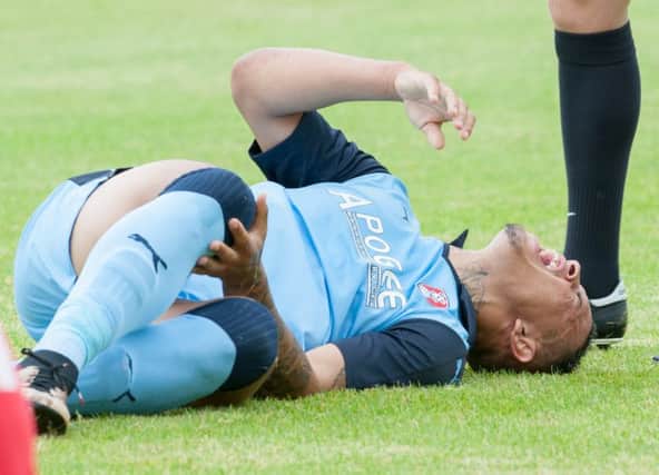 Jonson Clarke-Harris suffers his injury in pre-season