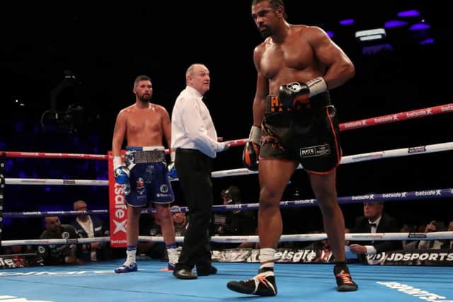 David Haye (right) takes on Tony Bellew during the heavyweight contest at The O2. Pics: Nick Potts/PA Wire