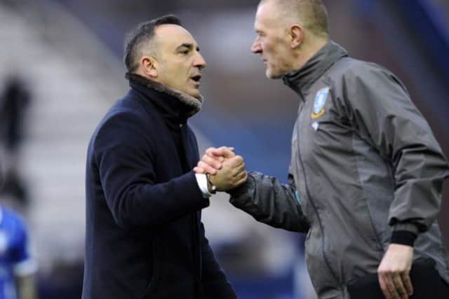 Owls boss Carlos Carvalhal with coach Lee Bullen following the 5-1 win over Norwich City at Hillsborough on Saturday
